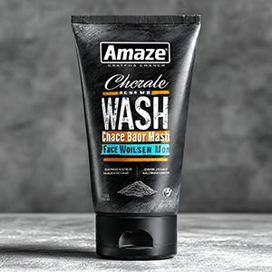 Professional matte black squeeze tube mockup for men's face wash, featuring charcoal branding on a grey concrete background.